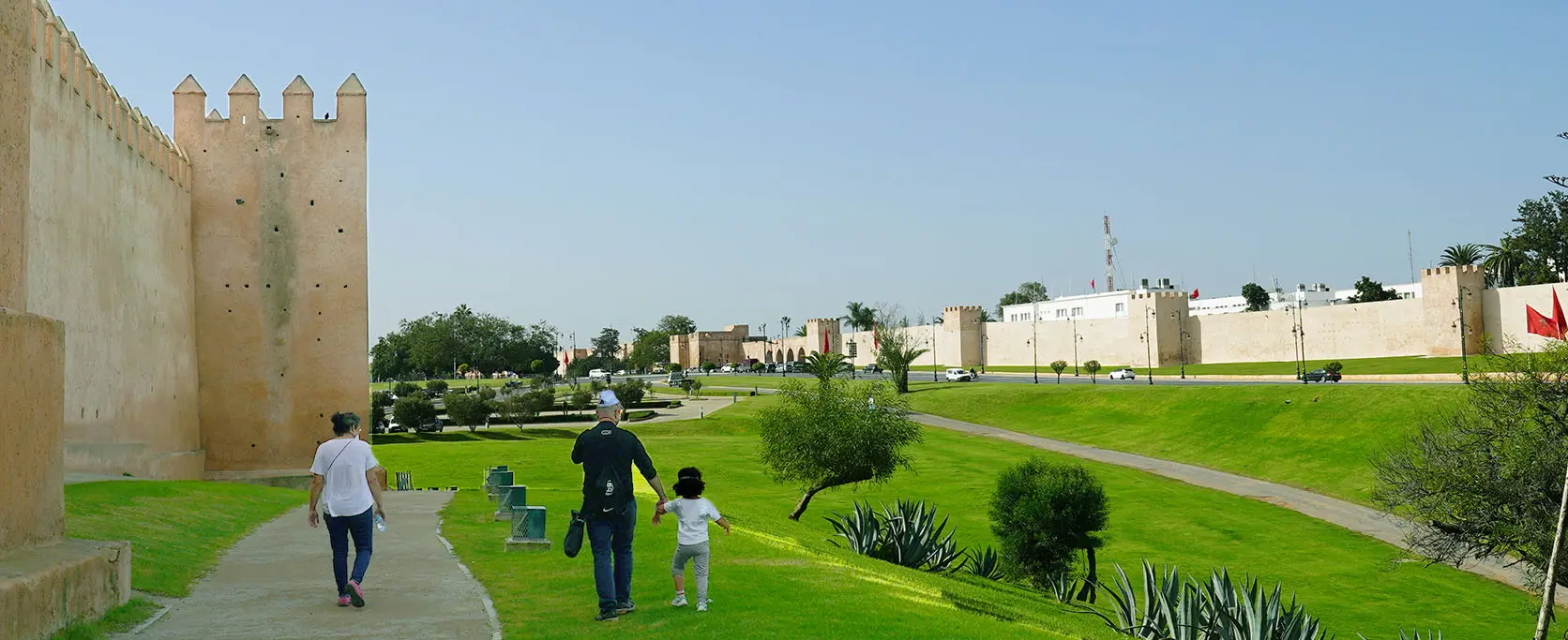 Visitors exploring the grandeur of Rabat’s monuments.