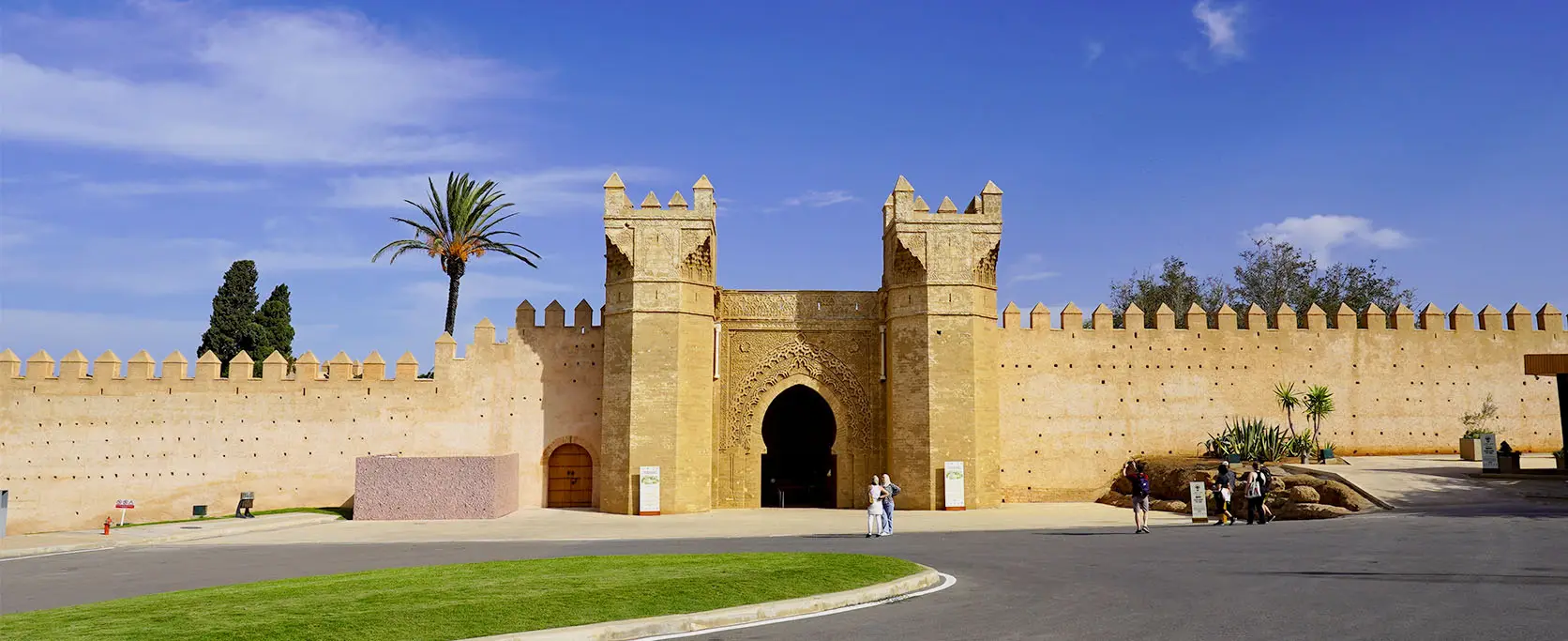 View of the Chellah ruins with a lush green landscape in Rabat, included in Morocco Tours & Transfers itineraries