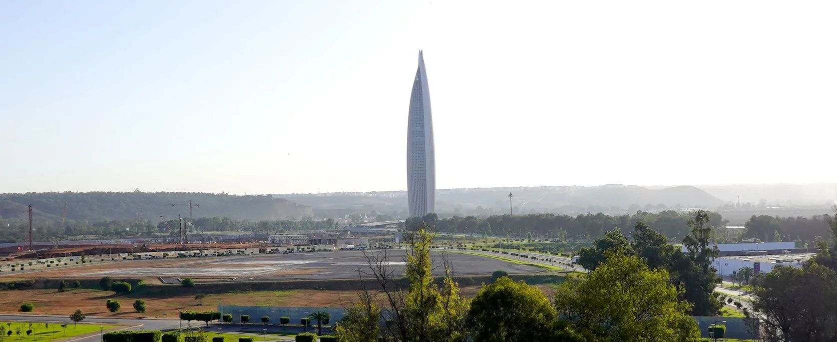 The Mohammed VI Tower standing tall in Rabat, Morocco, surrounded by green spaces