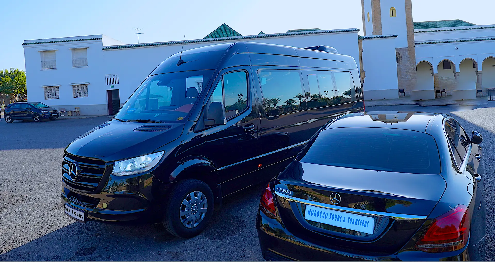 Luxury Mercedes Sprinter and Mercedes Class E vehicles used by Morocco Tours & Transfers, parked and ready for group and private travel in Morocco